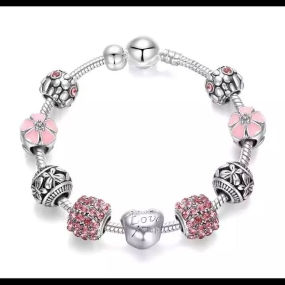 TRENDY PINK 9 PIECE CHARM BRACELET - Picture 1 of 4